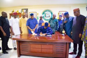 Governor Abiodun signing the bill into law
